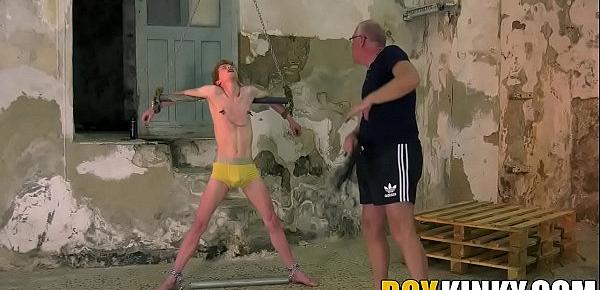  Mature freak plays with his submissive slave in the dungeon